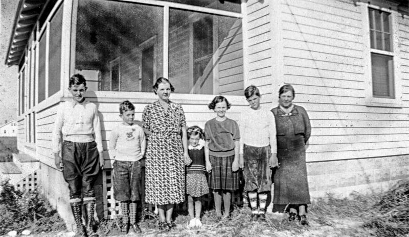 Beside the Walsh family cottage in the late 1930s are (l-r) James “Jimmy” Walsh, Jerome Walsh, Madeline Walsh, Joan Walsh, Mary Walsh, John Walsh and Mary Dugan. WALSH FAMILY PHOTO
